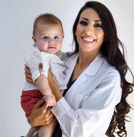 Dr. Monica Efstathiou with a Baby at Embryon Fertility Center in Cyprus
